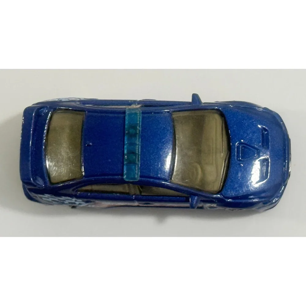 MATCHBOX 2010 BLUE MITSUBISHI EVOLUTION X POLICE 1:62 DIE-CAST TOY CAR MATTEL‎